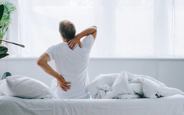 old men with back pain